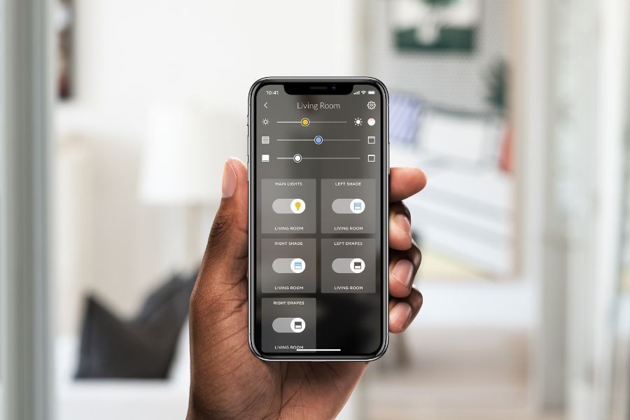 Control4 Touch panel in a able with a traditional home in the background